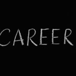 Chalk writing of 'Career' on a blackboard, symbolizing professions and jobs.