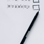 A pen beside checkboxes labeled 'Balance' and 'Burnout'. Choose wisely.